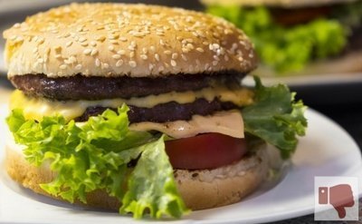 Cheeseburgers - The Worst Foods For Getting A Good Night's Sleep